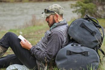 Reading by river