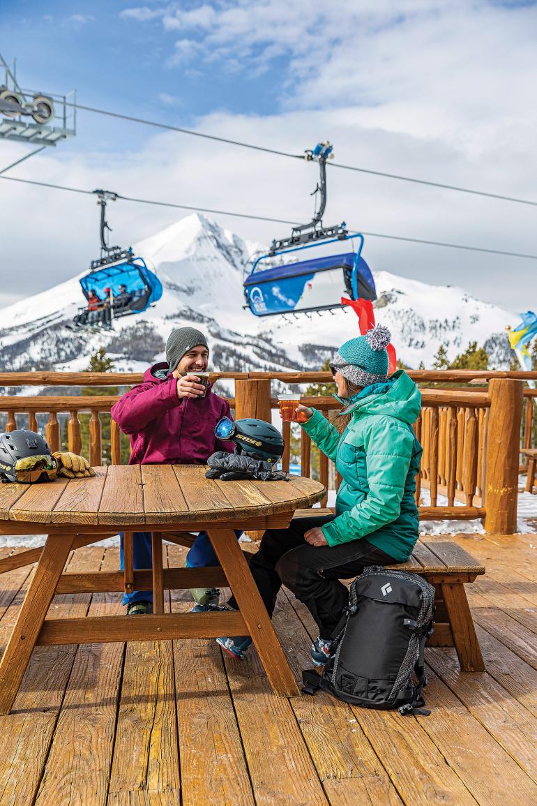 Skiing apres beer drinking on patio