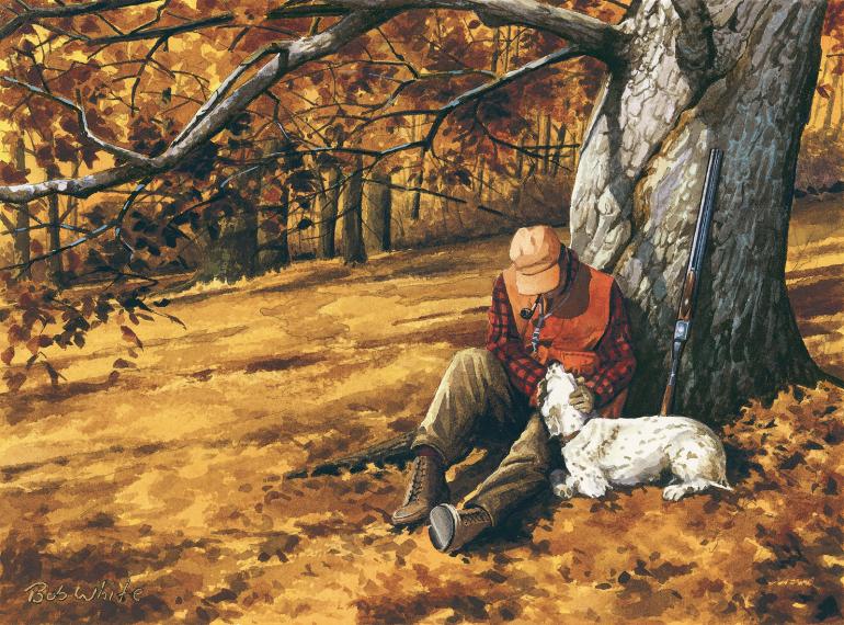 man and dog resting hunting