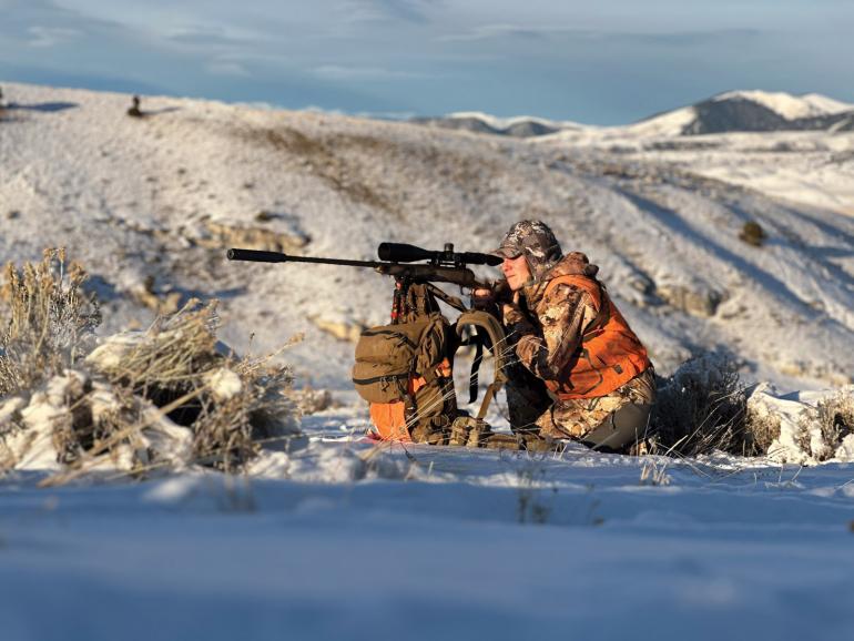 woman hunting montana snow