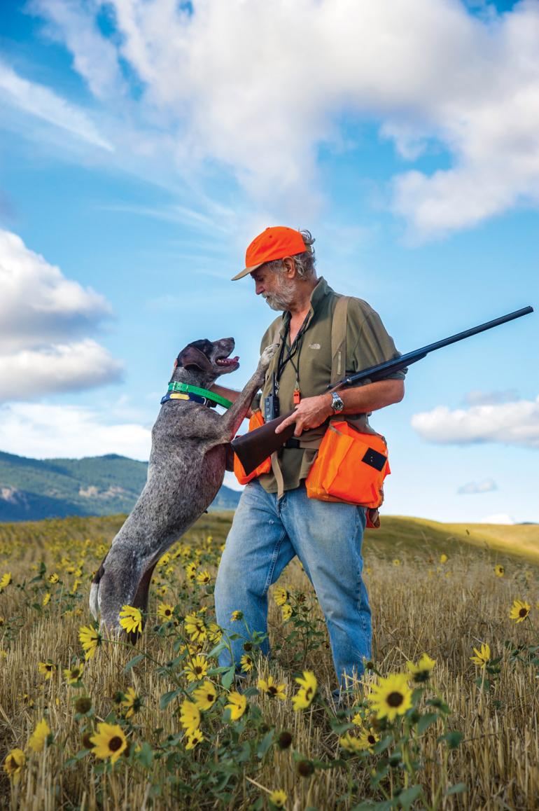 Hunting dog and man