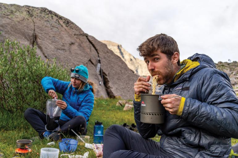 eating dinner backpacking