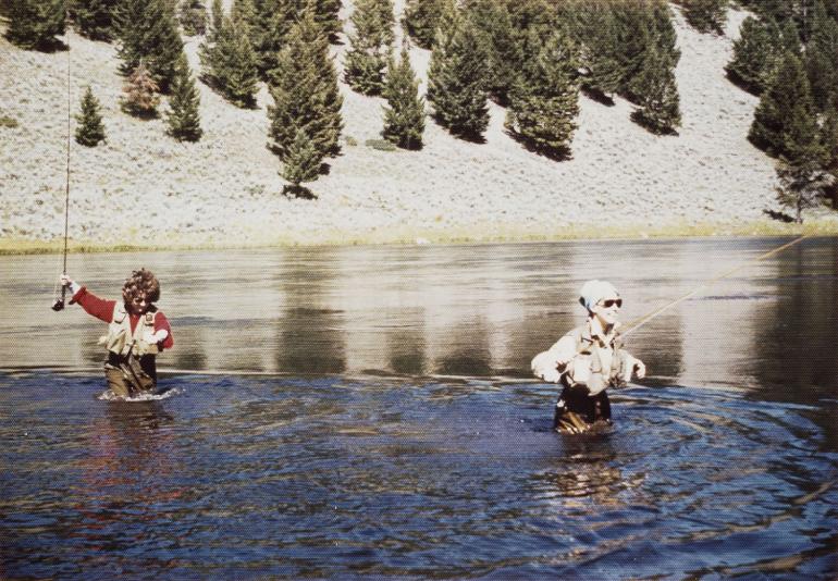 Two women fly fishing in the 1970's