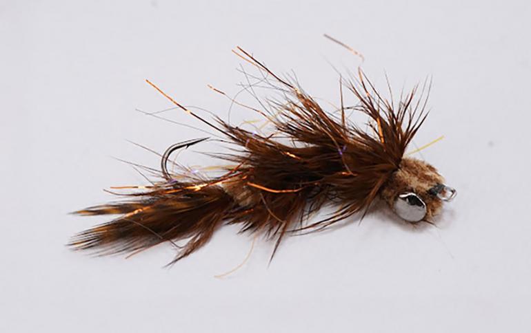 A finished crulpin fly 