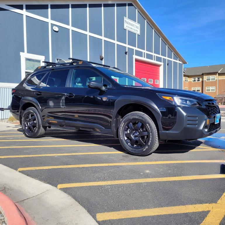 Clean and polished Subaru after a full wash and detail by SwissDetail. 