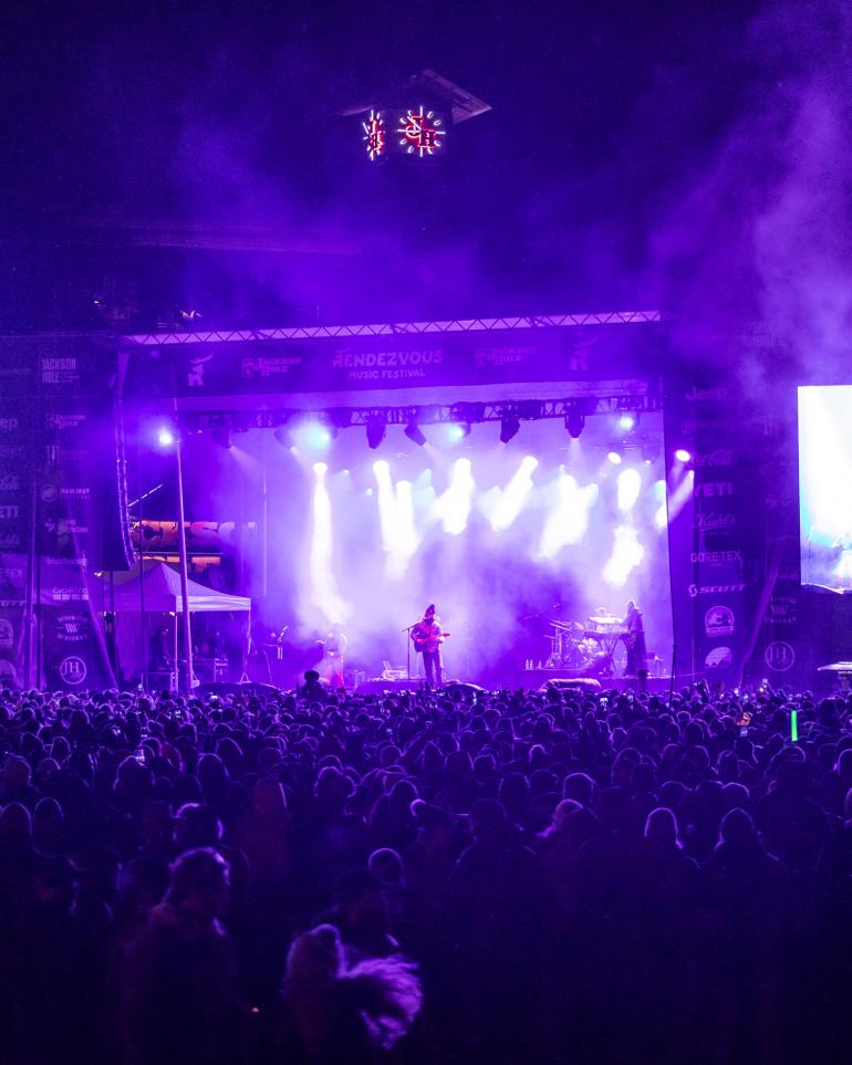 purple lights on the stage at the Rendezvous festival