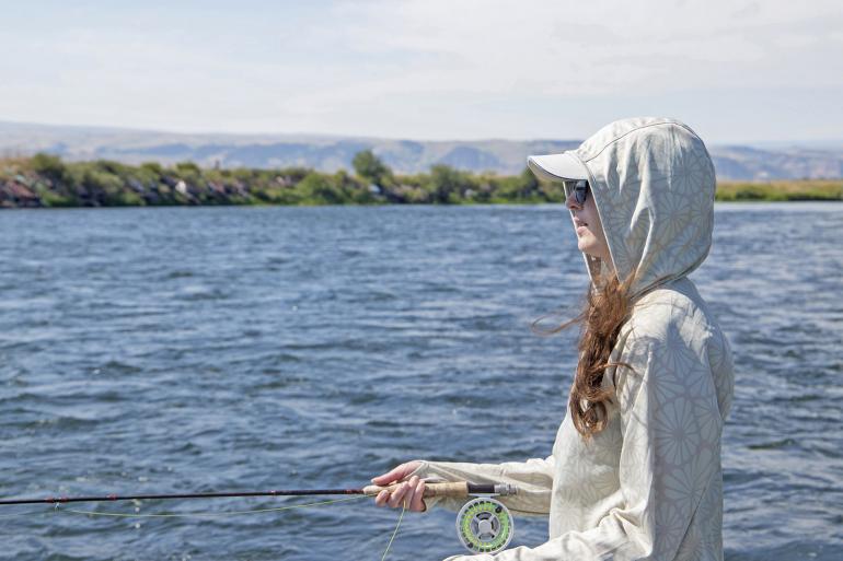 Woman fly fishing on the Big Hole