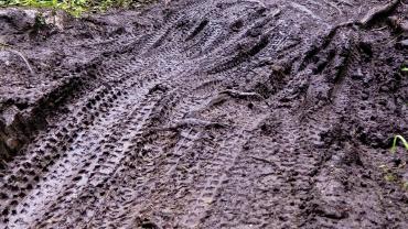 muddy bike tracks outside bozeman