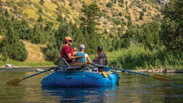 Fishing from raft in bear trap canyon madison river