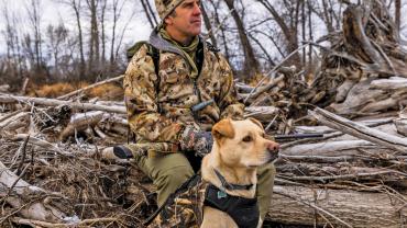 dog and hunter waterfowl