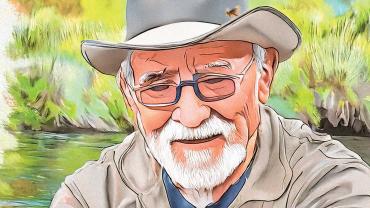 old man holding fish