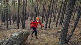 Trail runner in forest old man