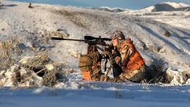 woman hunting montana snow