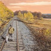 bird hunting dog walking on train track
