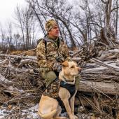 dog and hunter waterfowl