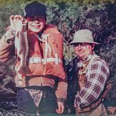 A boy catches his first Montana trout